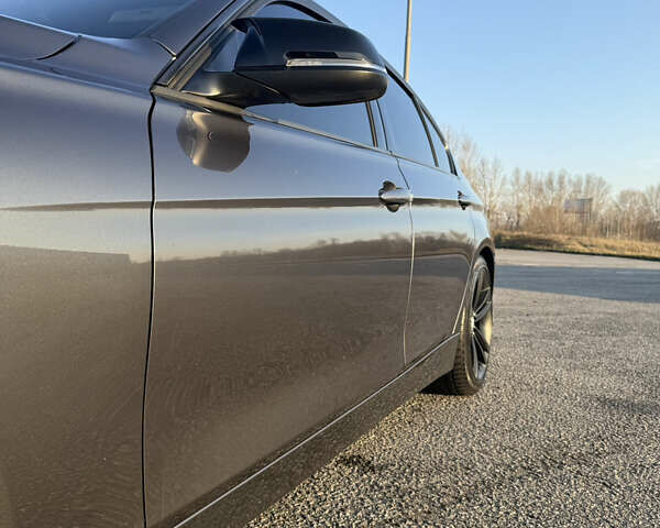 Серый БМВ 3 Серия, объемом двигателя 2 л и пробегом 140 тыс. км за 14000 $, фото 18 на Automoto.ua