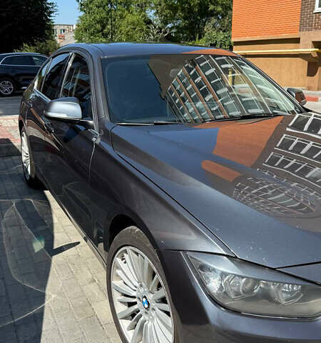 Серый БМВ 3 Серия, объемом двигателя 2 л и пробегом 209 тыс. км за 14100 $, фото 2 на Automoto.ua