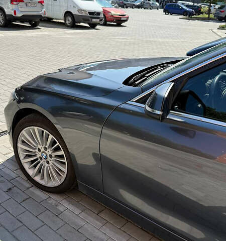 Серый БМВ 3 Серия, объемом двигателя 2 л и пробегом 209 тыс. км за 14100 $, фото 1 на Automoto.ua