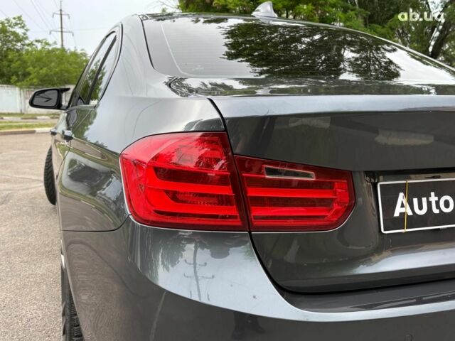 Сірий БМВ 3 Серія, об'ємом двигуна 2 л та пробігом 210 тис. км за 13390 $, фото 12 на Automoto.ua