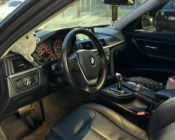 Серый БМВ 3 Серия, объемом двигателя 2 л и пробегом 200 тыс. км за 12499 $, фото 4 на Automoto.ua