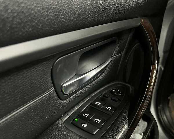 Серый БМВ 3 Серия, объемом двигателя 2 л и пробегом 183 тыс. км за 12500 $, фото 4 на Automoto.ua