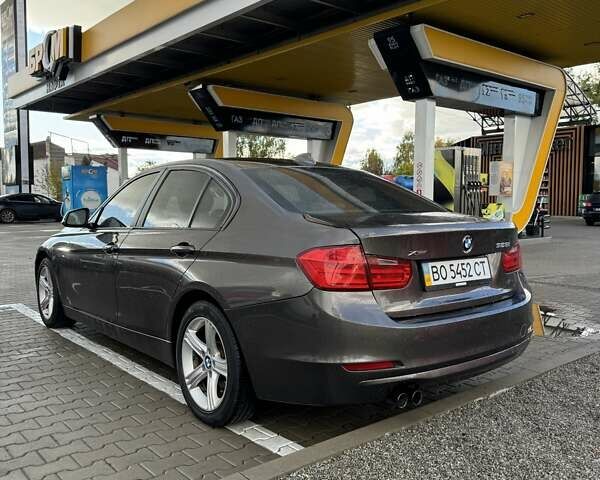 Серый БМВ 3 Серия, объемом двигателя 2 л и пробегом 250 тыс. км за 12999 $, фото 3 на Automoto.ua