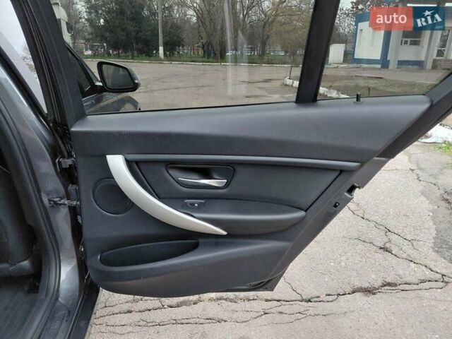 Серый БМВ 3 Серия, объемом двигателя 2 л и пробегом 250 тыс. км за 11900 $, фото 26 на Automoto.ua