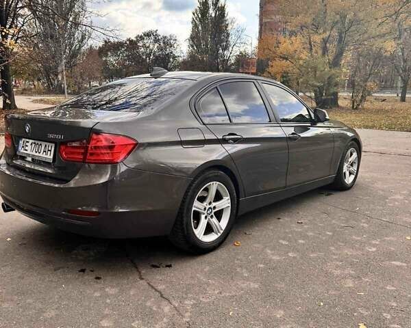 Серый БМВ 3 Серия, объемом двигателя 2 л и пробегом 203 тыс. км за 12000 $, фото 2 на Automoto.ua