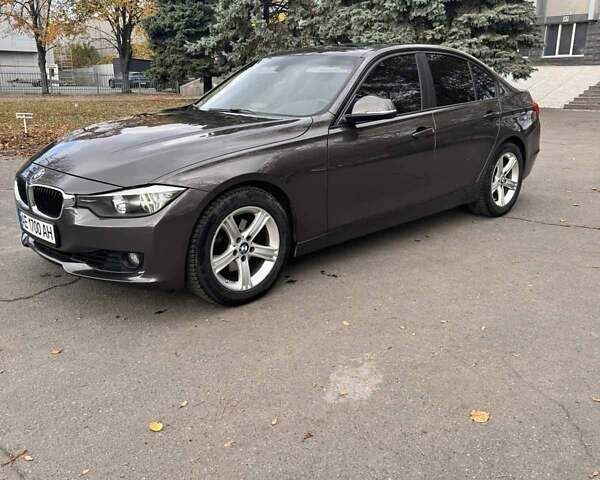 Серый БМВ 3 Серия, объемом двигателя 2 л и пробегом 203 тыс. км за 12000 $, фото 1 на Automoto.ua