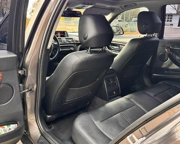 Серый БМВ 3 Серия, объемом двигателя 2 л и пробегом 203 тыс. км за 12000 $, фото 5 на Automoto.ua