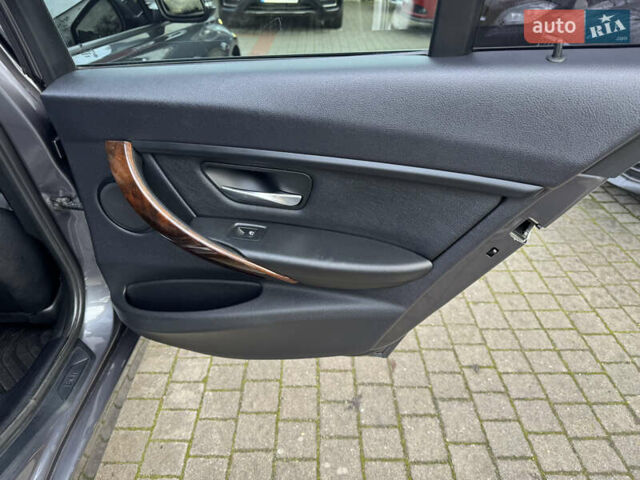 Серый БМВ 3 Серия, объемом двигателя 2 л и пробегом 198 тыс. км за 11700 $, фото 18 на Automoto.ua