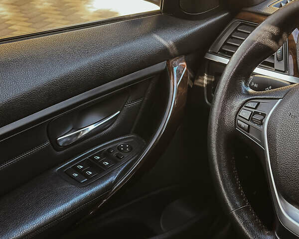 Серый БМВ 3 Серия, объемом двигателя 2 л и пробегом 185 тыс. км за 12500 $, фото 7 на Automoto.ua