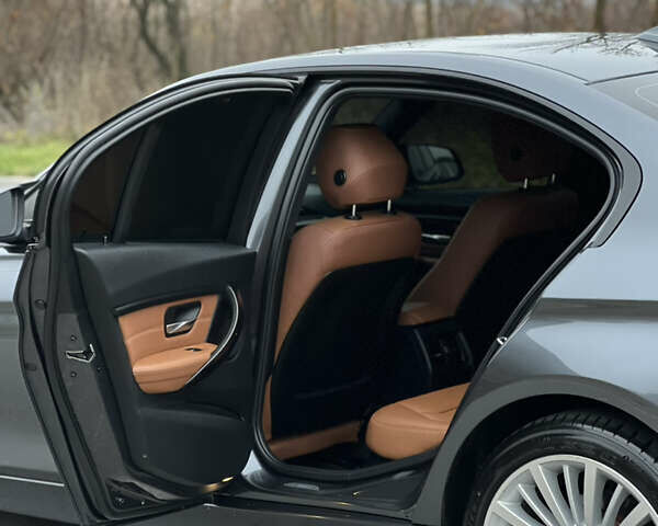 Серый БМВ 3 Серия, объемом двигателя 2 л и пробегом 178 тыс. км за 15999 $, фото 102 на Automoto.ua