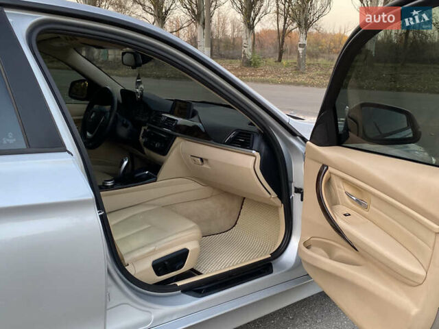 Серый БМВ 3 Серия, объемом двигателя 2 л и пробегом 220 тыс. км за 10990 $, фото 14 на Automoto.ua