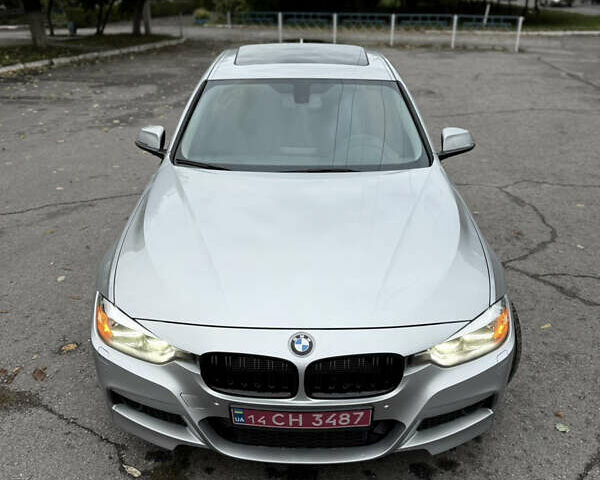Серый БМВ 3 Серия, объемом двигателя 2 л и пробегом 143 тыс. км за 12000 $, фото 1 на Automoto.ua