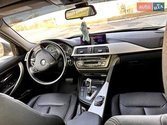 Серый БМВ 3 Серия, объемом двигателя 2 л и пробегом 145 тыс. км за 12800 $, фото 5 на Automoto.ua