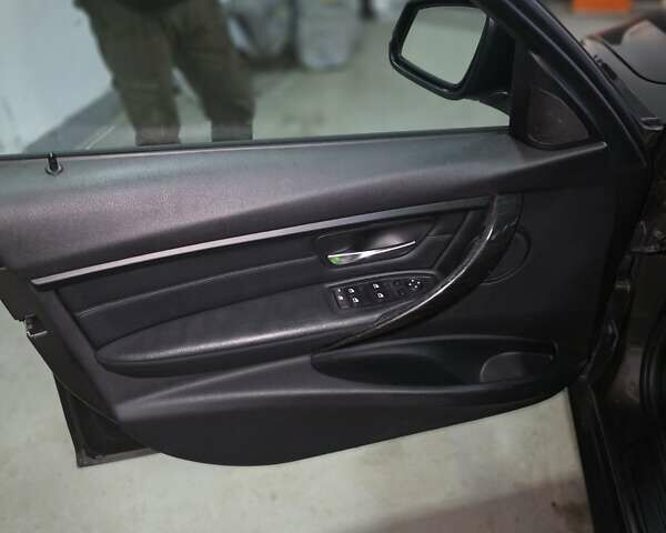 Серый БМВ 3 Серия, объемом двигателя 2 л и пробегом 324 тыс. км за 15750 $, фото 12 на Automoto.ua