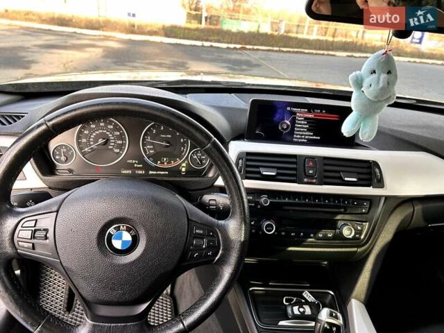 Серый БМВ 3 Серия, объемом двигателя 2 л и пробегом 145 тыс. км за 12800 $, фото 17 на Automoto.ua