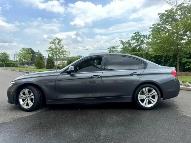 Серый БМВ 3 Серия, объемом двигателя 2 л и пробегом 71 тыс. км за 7000 $, фото 1 на Automoto.ua