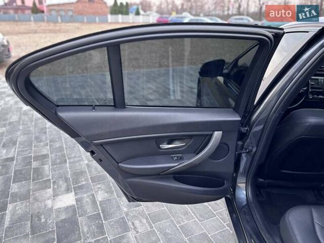 Серый БМВ 3 Серия, объемом двигателя 2 л и пробегом 180 тыс. км за 12999 $, фото 21 на Automoto.ua