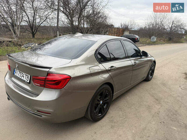 Серый БМВ 3 Серия, объемом двигателя 2 л и пробегом 129 тыс. км за 17499 $, фото 3 на Automoto.ua