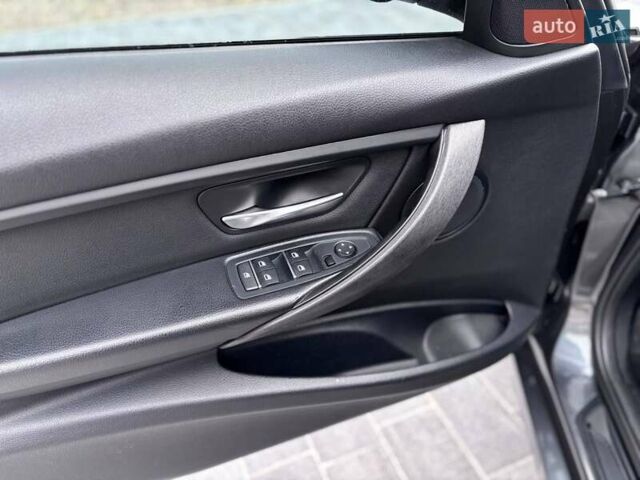 Серый БМВ 3 Серия, объемом двигателя 2 л и пробегом 180 тыс. км за 12999 $, фото 10 на Automoto.ua