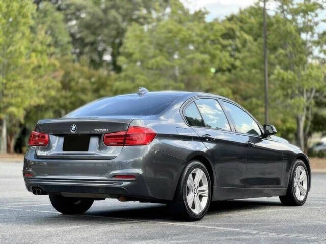 Серый БМВ 3 Серия, объемом двигателя 2 л и пробегом 74 тыс. км за 9500 $, фото 6 на Automoto.ua