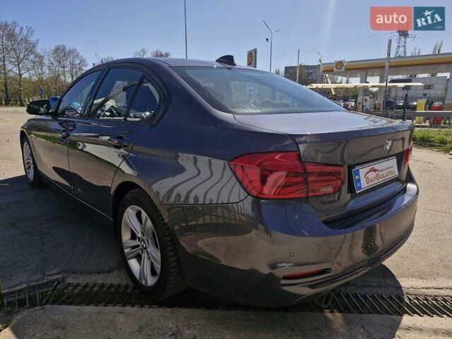 Серый БМВ 3 Серия, объемом двигателя 2 л и пробегом 173 тыс. км за 18699 $, фото 5 на Automoto.ua