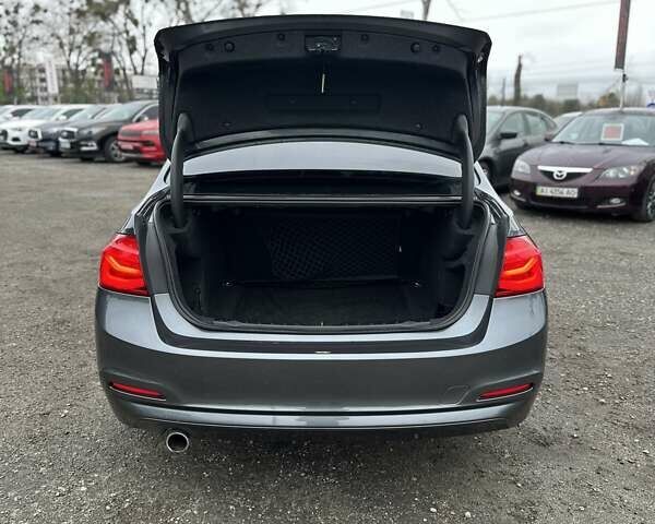 Серый БМВ 3 Серия, объемом двигателя 2 л и пробегом 132 тыс. км за 16700 $, фото 12 на Automoto.ua