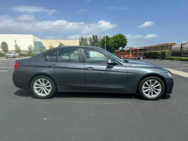 Серый БМВ 3 Серия, объемом двигателя 2 л и пробегом 32 тыс. км за 8000 $, фото 3 на Automoto.ua