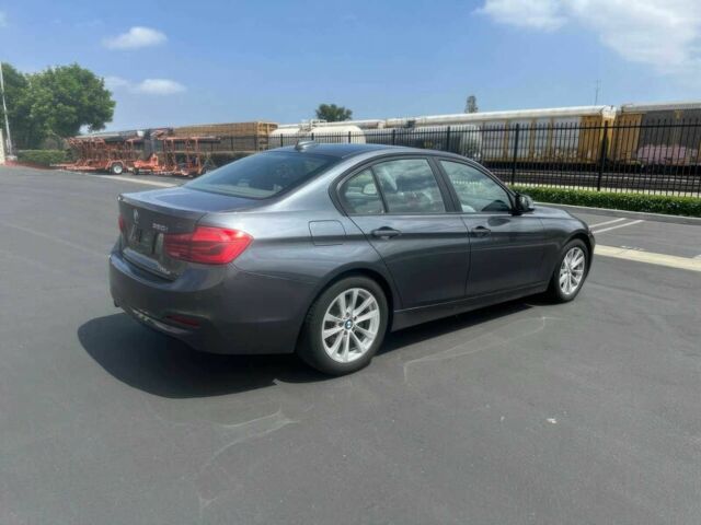 Серый БМВ 3 Серия, объемом двигателя 2 л и пробегом 32 тыс. км за 8000 $, фото 5 на Automoto.ua