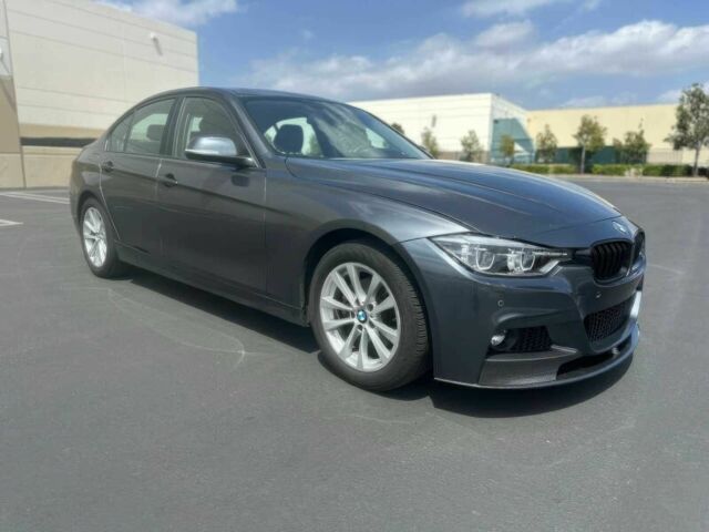 Серый БМВ 3 Серия, объемом двигателя 2 л и пробегом 32 тыс. км за 8000 $, фото 2 на Automoto.ua