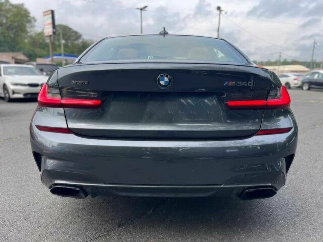 Серый БМВ 3 Серия, объемом двигателя 3 л и пробегом 29 тыс. км за 27500 $, фото 5 на Automoto.ua