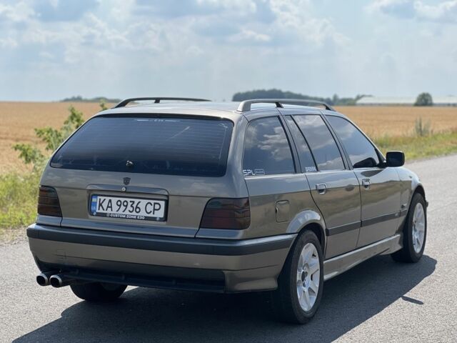 Серый БМВ 3 Серия, объемом двигателя 2.5 л и пробегом 365 тыс. км за 4000 $, фото 2 на Automoto.ua