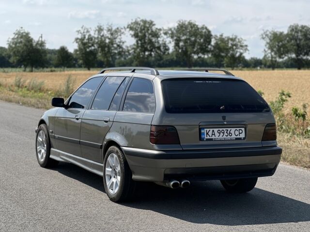 Серый БМВ 3 Серия, объемом двигателя 2.5 л и пробегом 365 тыс. км за 4000 $, фото 4 на Automoto.ua