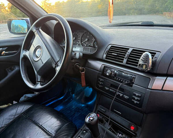 Серый БМВ 3 Серия, объемом двигателя 2 л и пробегом 260 тыс. км за 4999 $, фото 4 на Automoto.ua