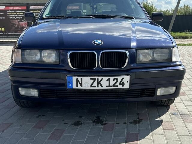 Синий БМВ 3 Серия, объемом двигателя 1.8 л и пробегом 300 тыс. км за 2350 $, фото 4 на Automoto.ua