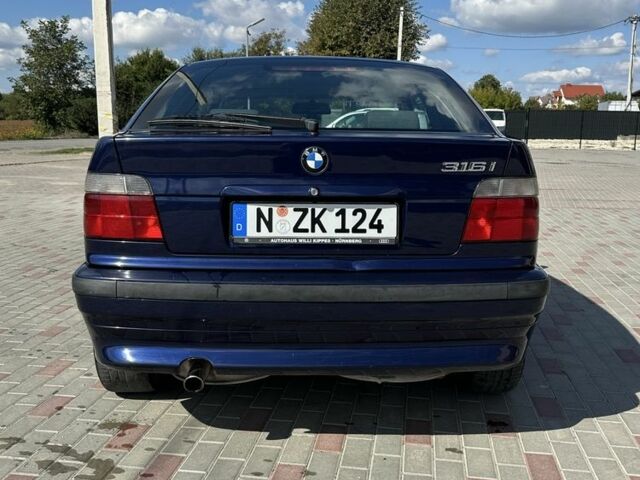 Синий БМВ 3 Серия, объемом двигателя 1.8 л и пробегом 300 тыс. км за 2350 $, фото 6 на Automoto.ua