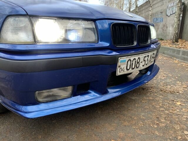 Синий БМВ 3 Серия, объемом двигателя 1.8 л и пробегом 550 тыс. км за 1950 $, фото 9 на Automoto.ua