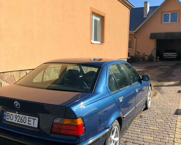 Синій БМВ 3 Серія, об'ємом двигуна 1.8 л та пробігом 465 тис. км за 2550 $, фото 3 на Automoto.ua