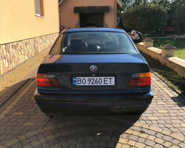 Синій БМВ 3 Серія, об'ємом двигуна 1.8 л та пробігом 465 тис. км за 2550 $, фото 4 на Automoto.ua