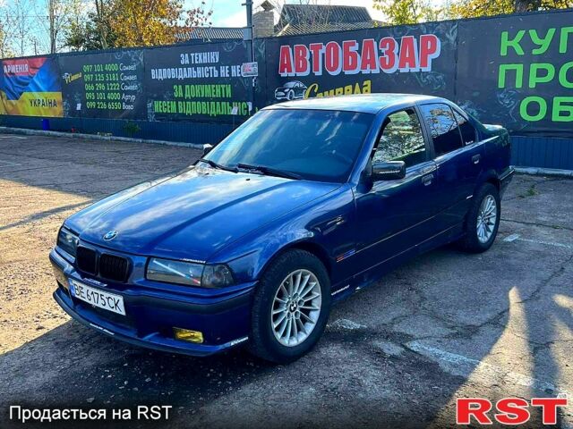 Синий БМВ 3 Серия, объемом двигателя 1.8 л и пробегом 211 тыс. км за 2400 $, фото 1 на Automoto.ua