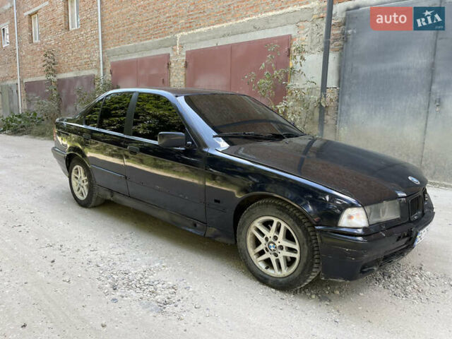 Синий БМВ 3 Серия, объемом двигателя 1.6 л и пробегом 250 тыс. км за 1950 $, фото 12 на Automoto.ua