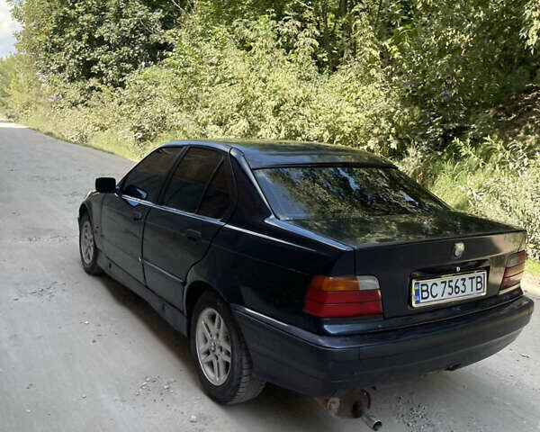 Синий БМВ 3 Серия, объемом двигателя 1.6 л и пробегом 250 тыс. км за 1950 $, фото 19 на Automoto.ua