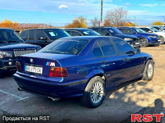 Синий БМВ 3 Серия, объемом двигателя 1.8 л и пробегом 211 тыс. км за 2400 $, фото 4 на Automoto.ua