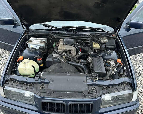 Синий БМВ 3 Серия, объемом двигателя 1.6 л и пробегом 350 тыс. км за 2700 $, фото 1 на Automoto.ua