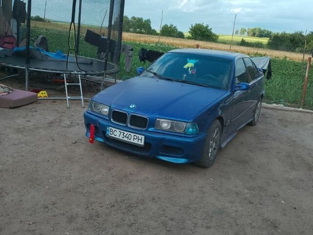 Синій БМВ 3 Серія, об'ємом двигуна 1.8 л та пробігом 1000 тис. км за 1700 $, фото 3 на Automoto.ua