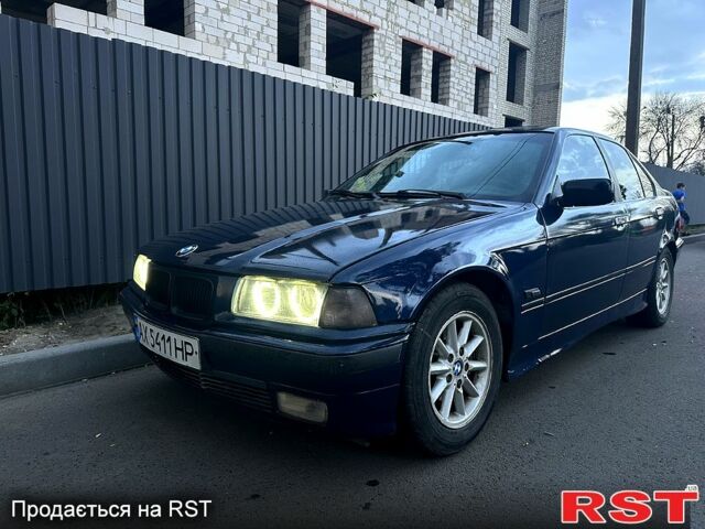 Синій БМВ 3 Серія, об'ємом двигуна 2 л та пробігом 490 тис. км за 2450 $, фото 3 на Automoto.ua