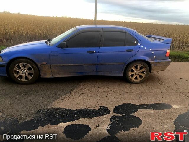 Синій БМВ 3 Серія, об'ємом двигуна 1.8 л та пробігом 400 тис. км за 2868 $, фото 3 на Automoto.ua