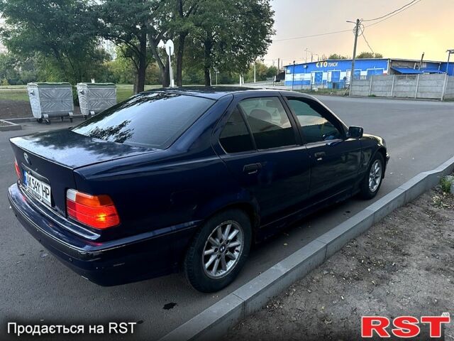 Синій БМВ 3 Серія, об'ємом двигуна 2 л та пробігом 490 тис. км за 2450 $, фото 7 на Automoto.ua