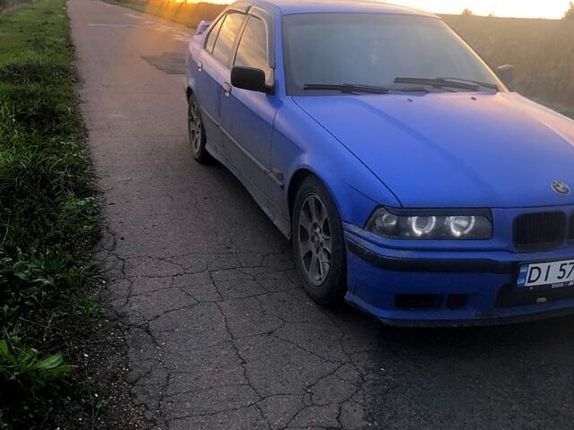 Синій БМВ 3 Серія, об'ємом двигуна 1.8 л та пробігом 400 тис. км за 2868 $, фото 1 на Automoto.ua