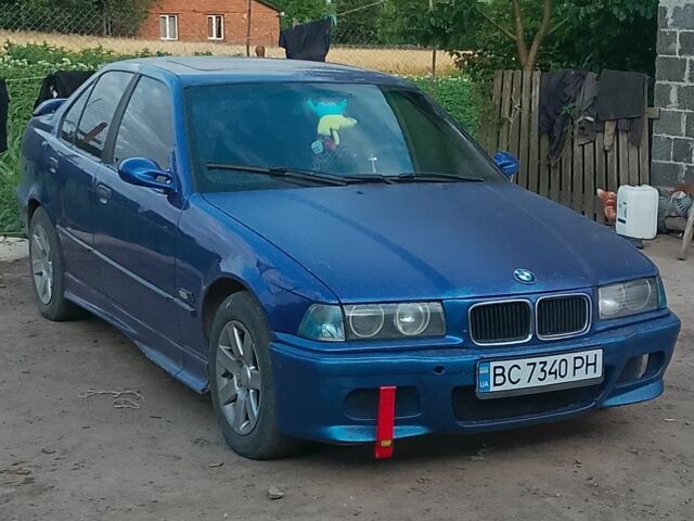 Синій БМВ 3 Серія, об'ємом двигуна 1.8 л та пробігом 1000 тис. км за 1700 $, фото 5 на Automoto.ua