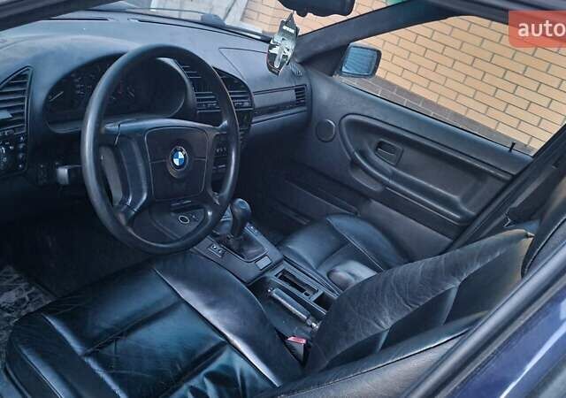 Синий БМВ 3 Серия, объемом двигателя 1.8 л и пробегом 438 тыс. км за 3000 $, фото 5 на Automoto.ua